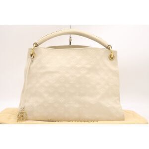 Gorgeous Louis Vuitton Artsy MM Monogram Empreinte Leather Tote in Ivory